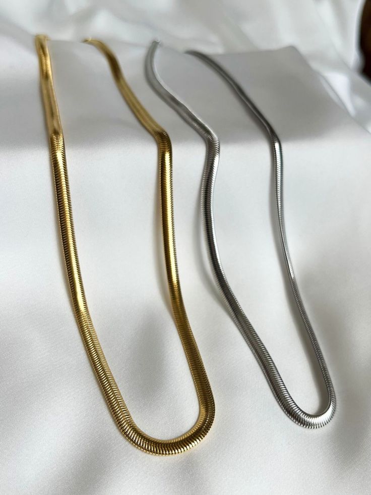 The Ultimate Duo: Gold and Silver Snake Chains